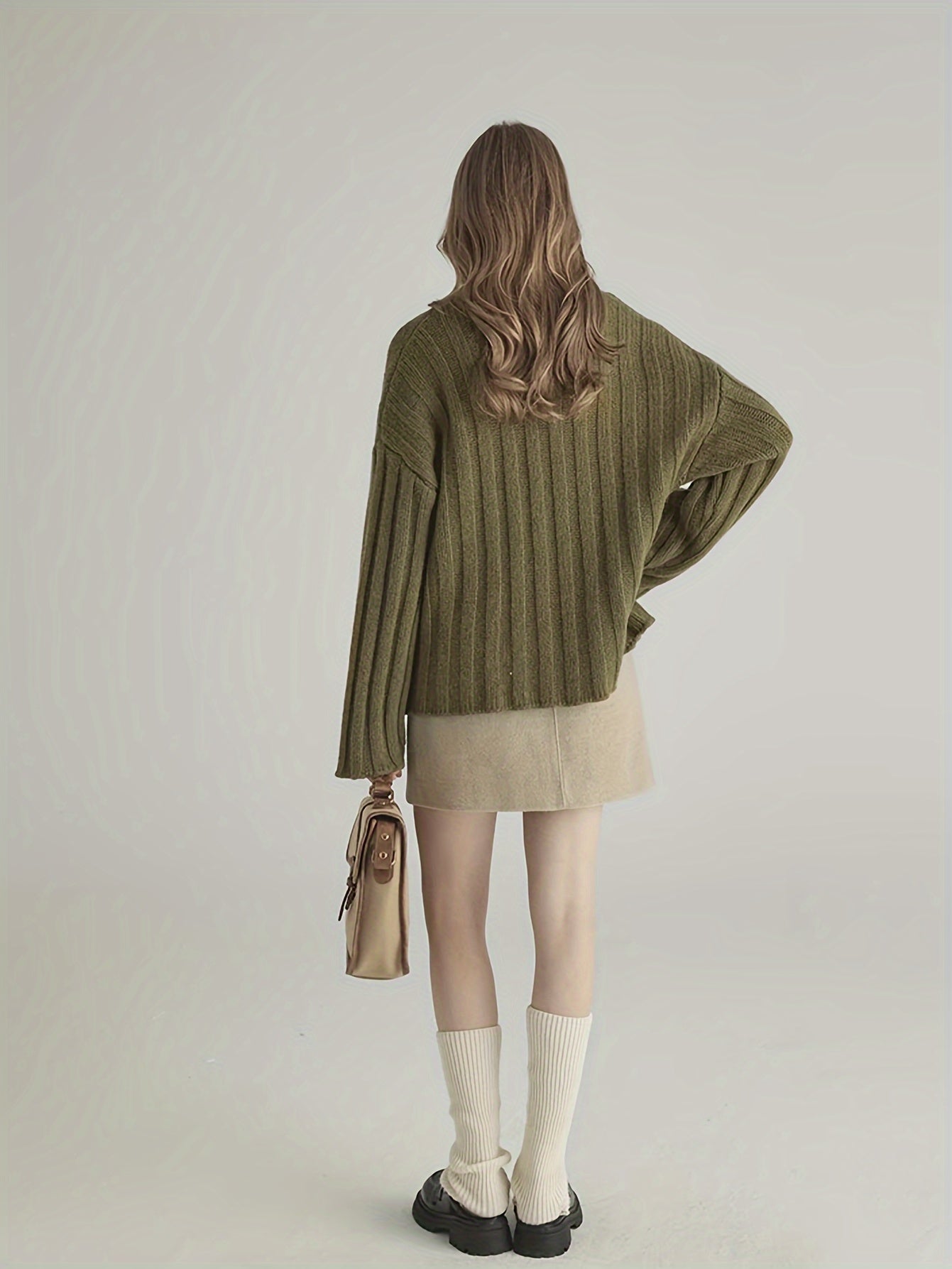 Wide sweater with ribbed detail